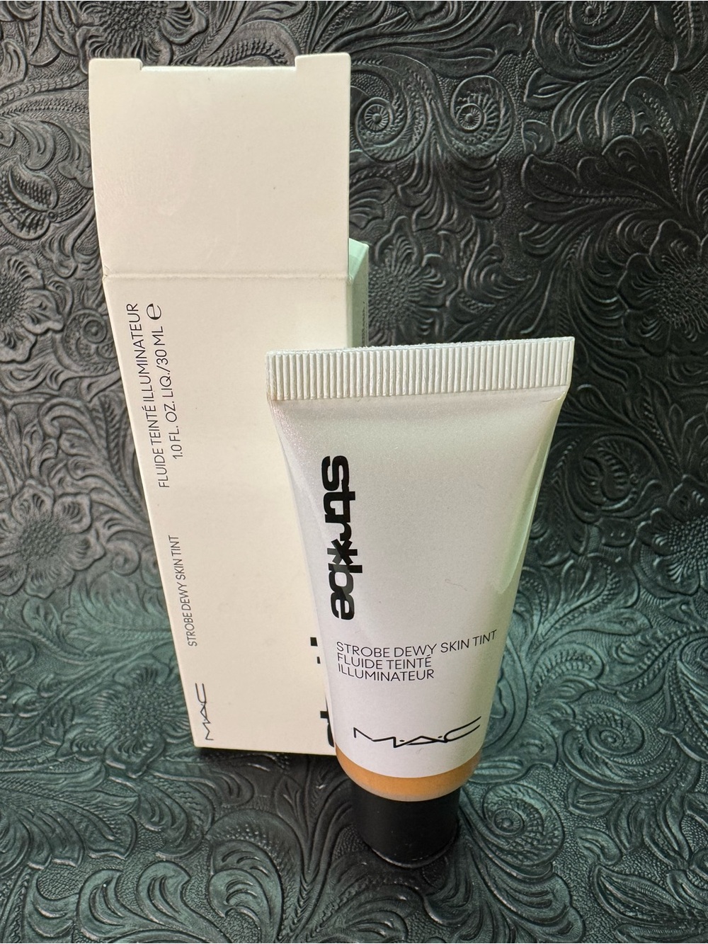 MAC Cosmetics Strobe Dewy Skin Tint - White & Black Packaging with Beige Tint